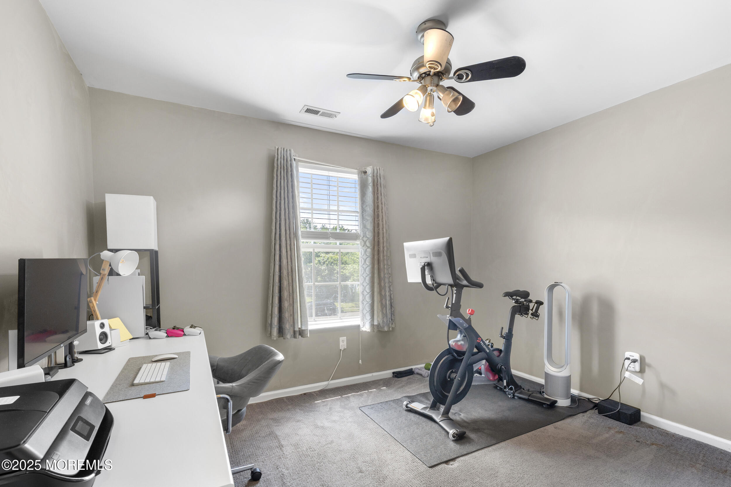 6 Kindling Way Jackson, NJ 08527 - Photo 26 of 54 a room with gym equipment and windows