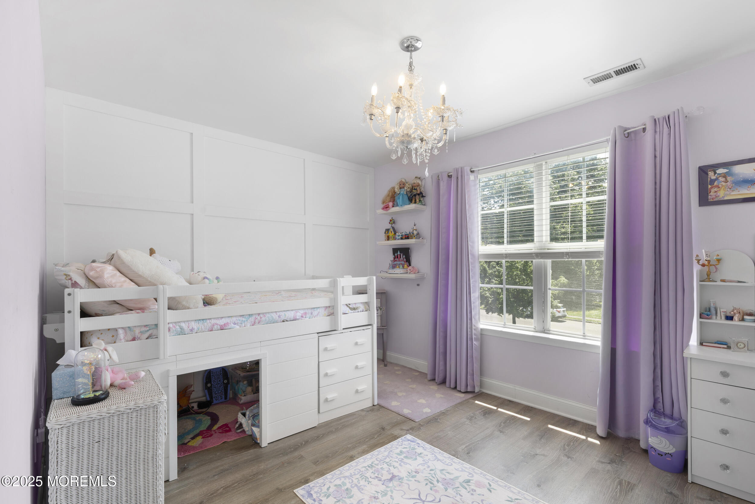 6 Kindling Way Jackson, NJ 08527 - Photo 27 of 54 a spacious bedroom with a bed and a chandelier