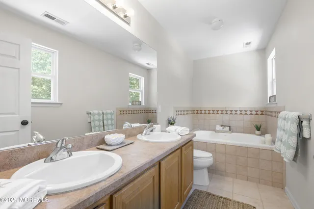 a view of a hallway with windows