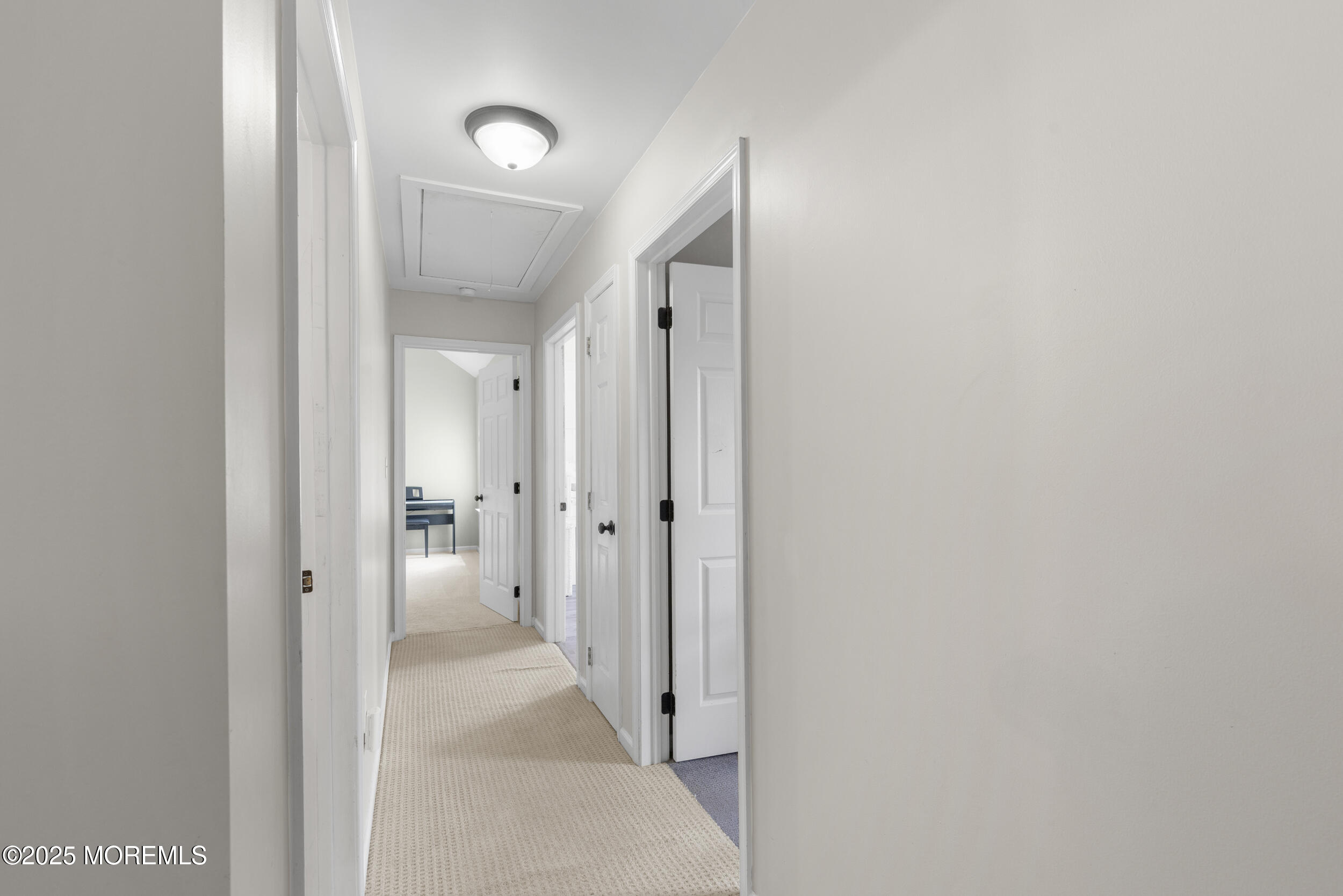 6 Kindling Way Jackson, NJ 08527 - Photo 33 of 54 a view of a hallway with wooden floor