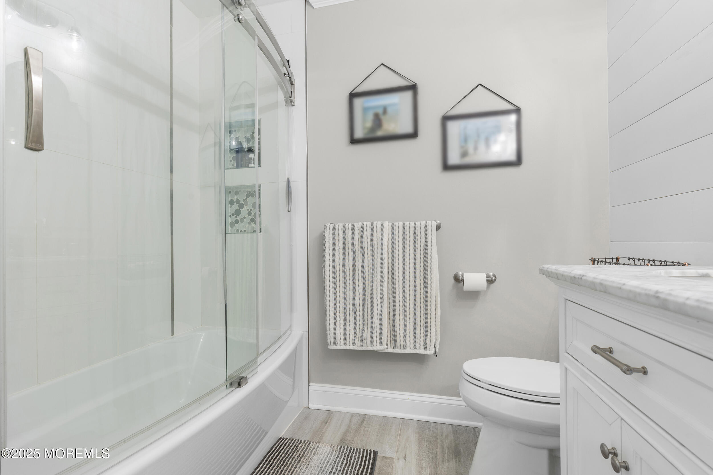 6 Kindling Way Jackson, NJ 08527 - Photo 35 of 54 a bathroom with a granite countertop toilet a sink and a bathtub