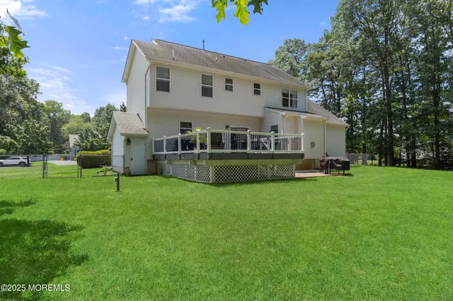 a view of a park with large trees