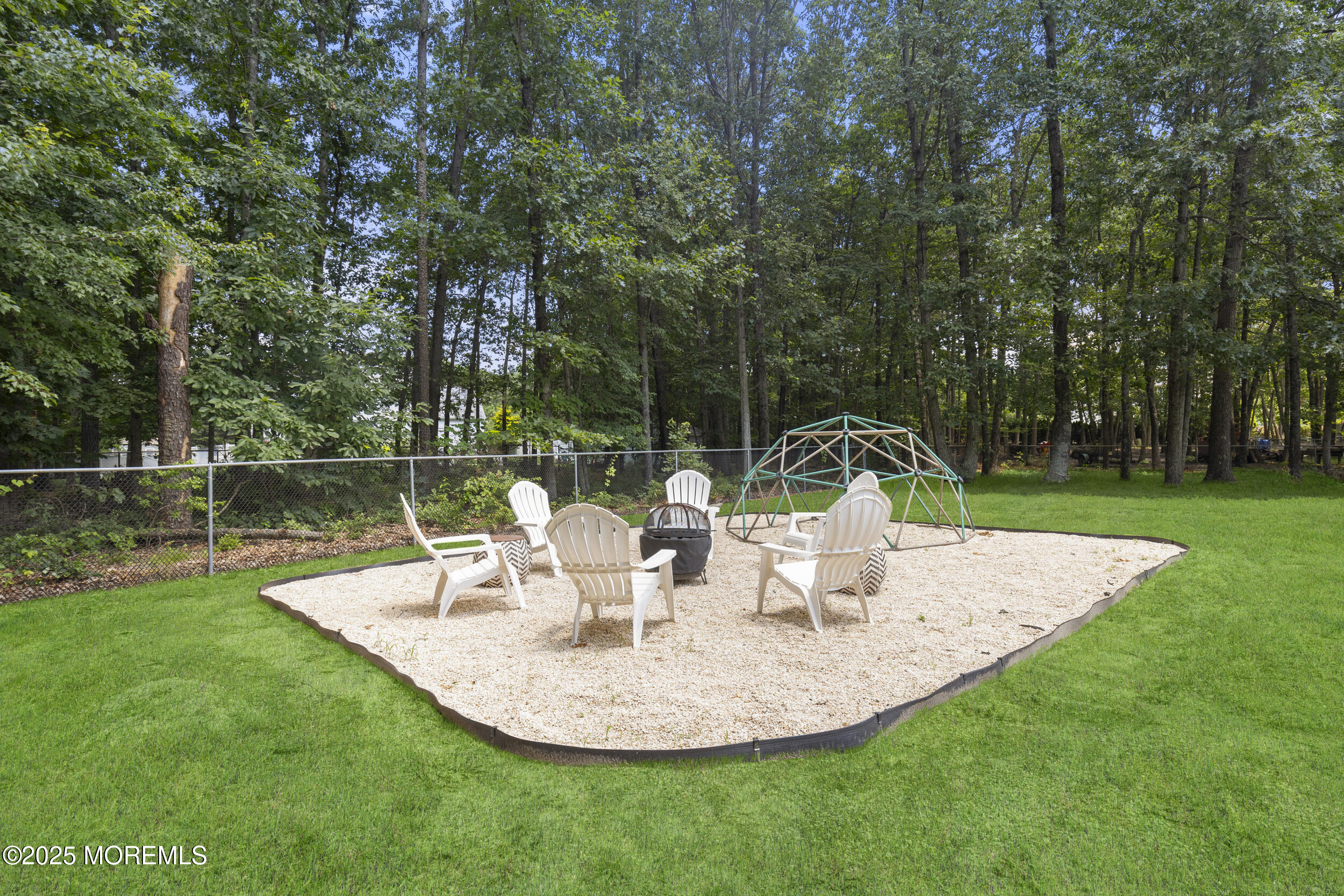 6 Kindling Way Jackson, NJ 08527 - Photo 42 of 54 a view of a park with a bench and garden