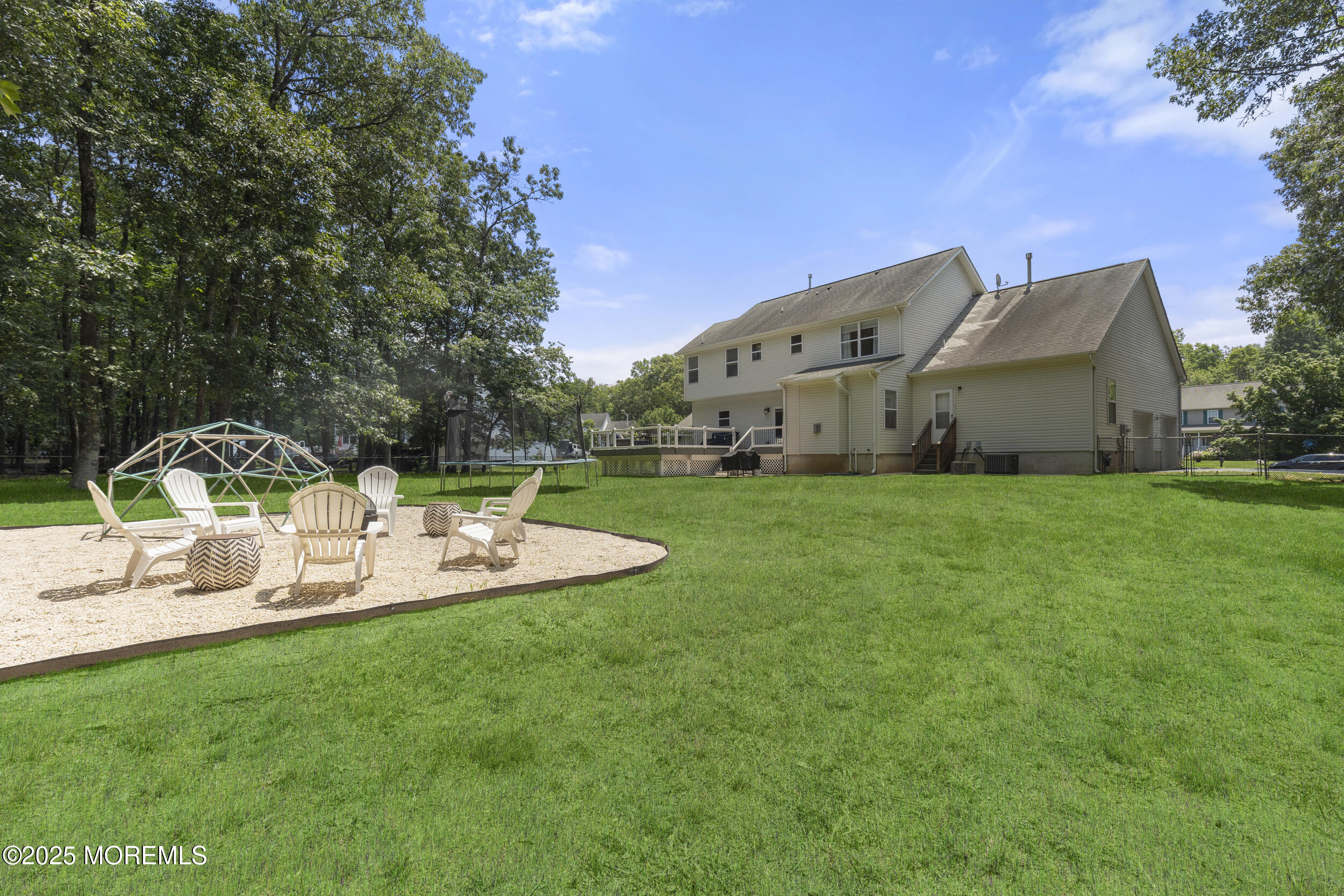 6 Kindling Way Jackson, NJ 08527 - Photo 43 of 54 a view of a house with backyard and sitting area