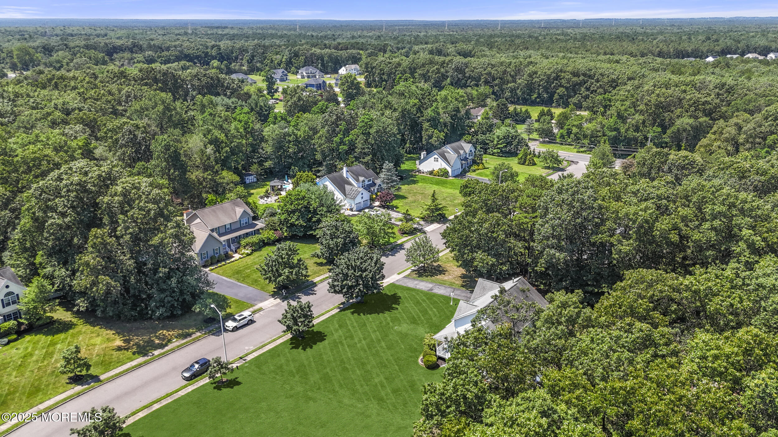 6 Kindling Way Jackson, NJ 08527 - Photo 52 of 54 an aerial view of residential houses with outdoor space and trees