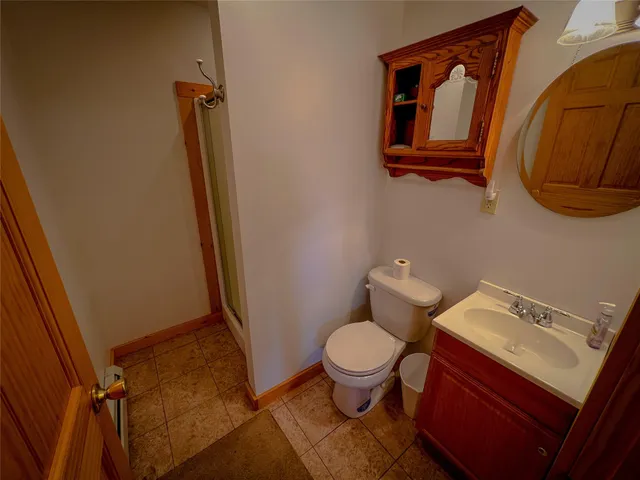a bathroom with a toilet and a sink