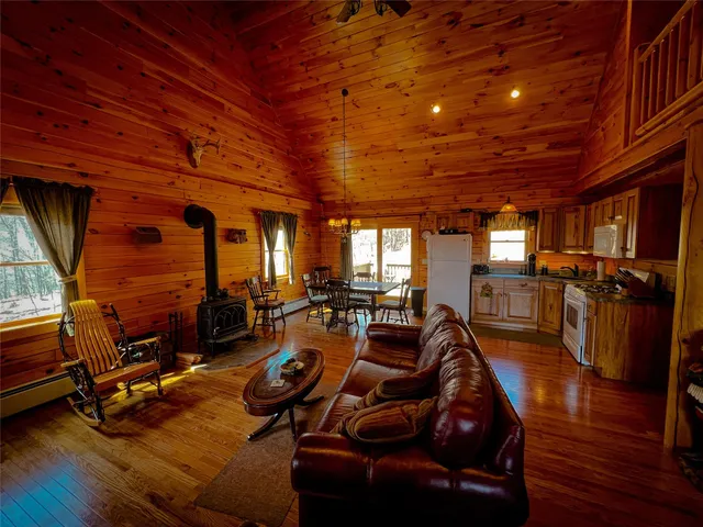 a view of a gym with wooden floor