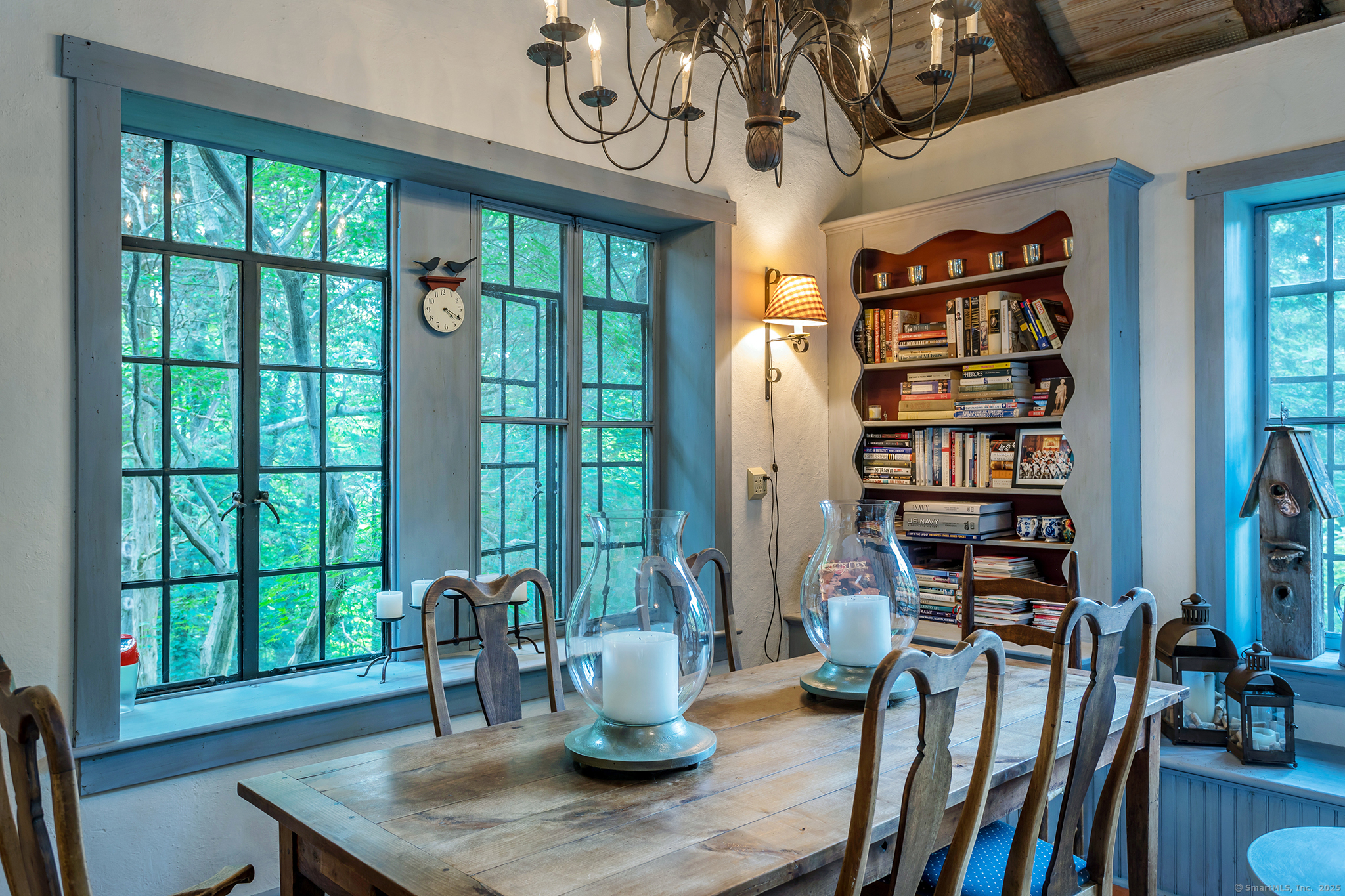 60 Leach Hollow Road Sherman, CT 06784 - Photo 20 of 24 a view of a dining room with furniture window and wooden floor