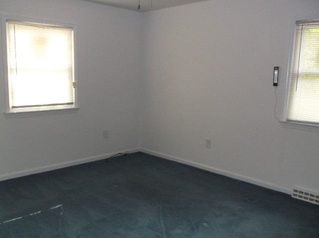 265 Fairgrounds Road Farmville, VA 23901 - Photo 8 of 14 an empty room with a window