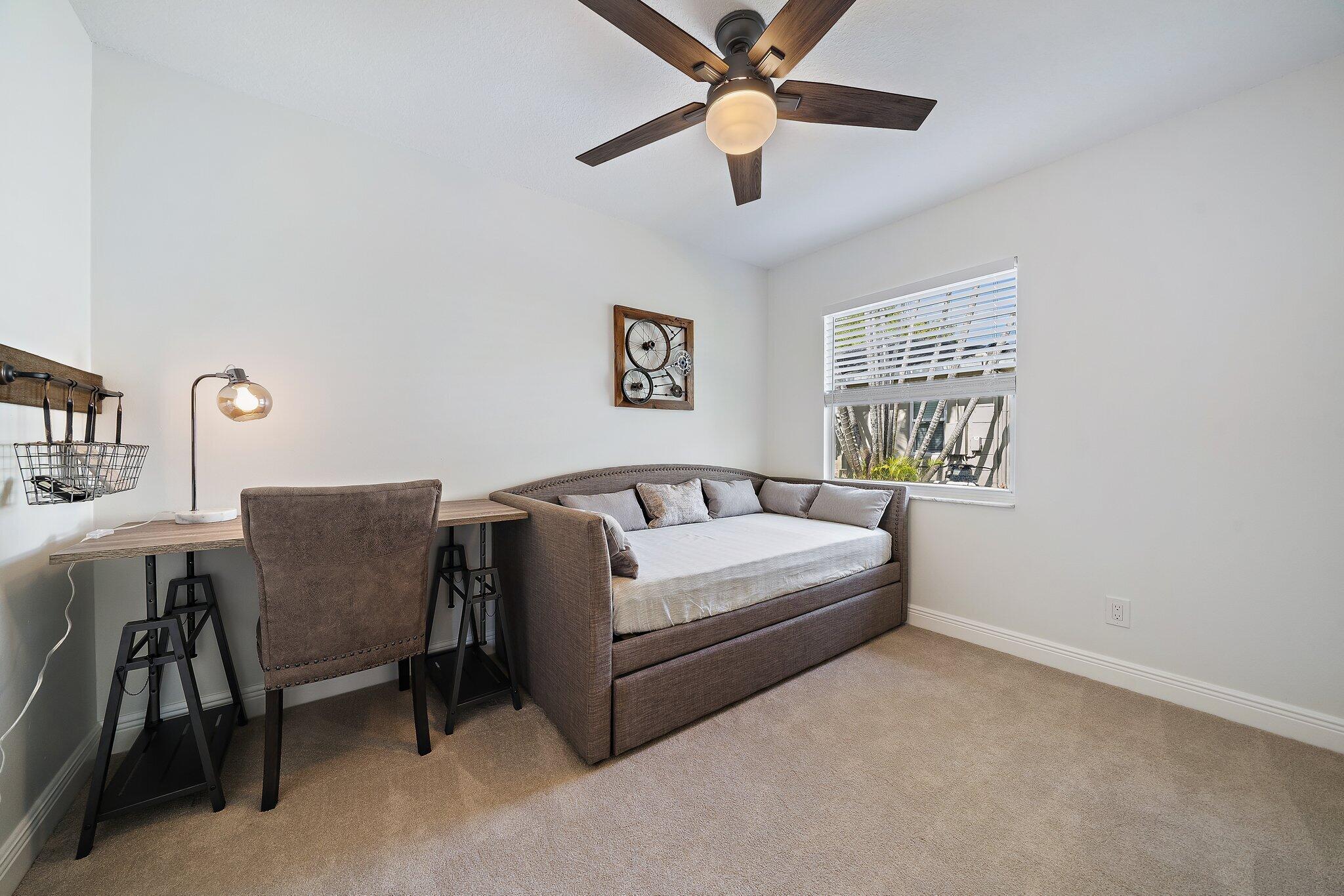 1342 Essex Drive Wellington, FL 33414 - Photo 42 of 58 a living room with furniture and a window