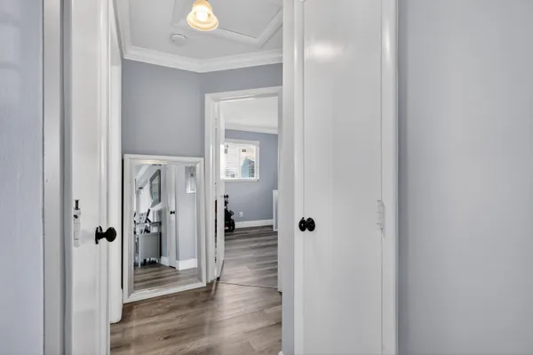 a view of a livingroom from a hallway
