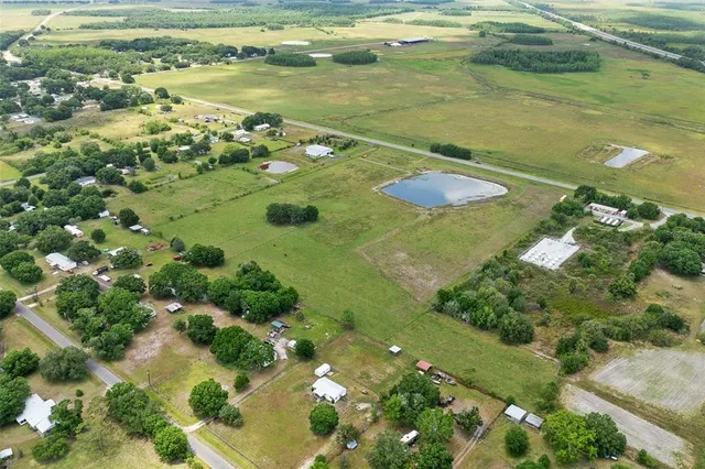 a view of a lake with a yard