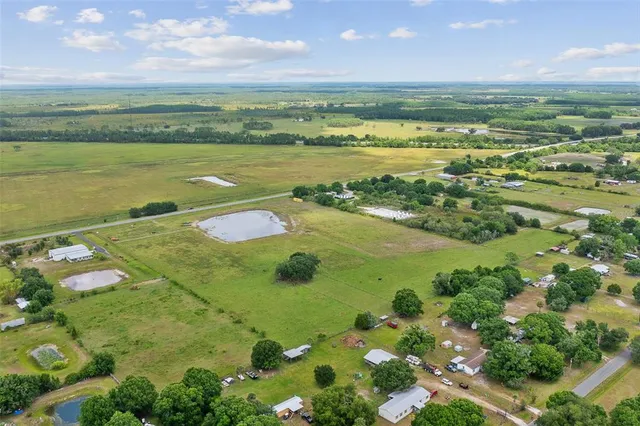 a view of a lake with a building in the background