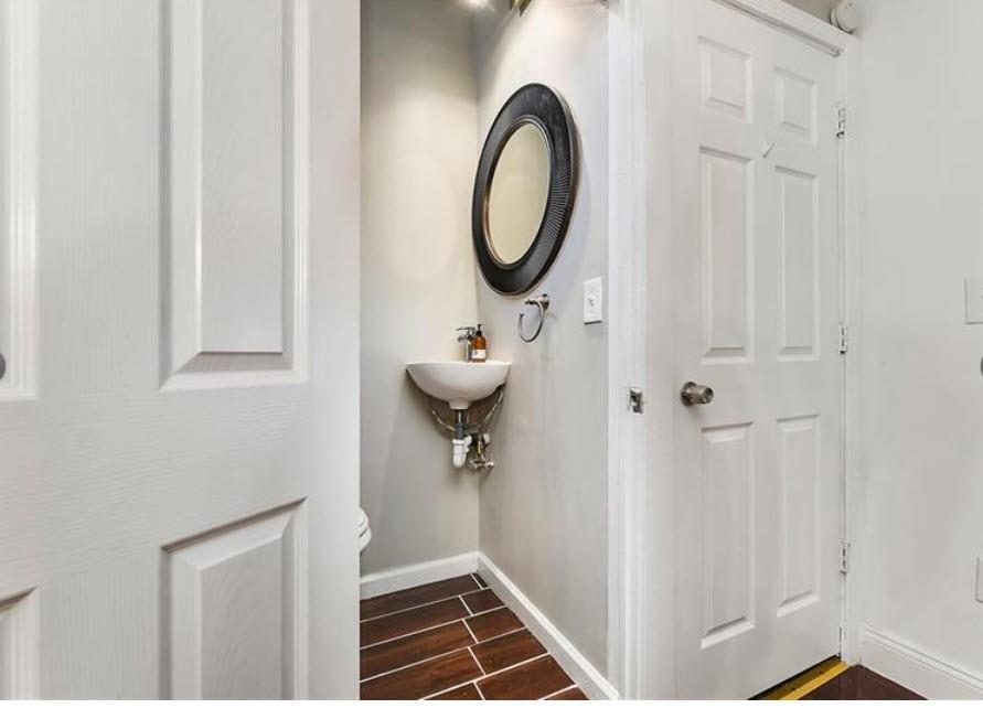 140 Home Street Pittsburgh, PA 15201 - Photo 14 of 25 a bathroom with a sink toilet and shower