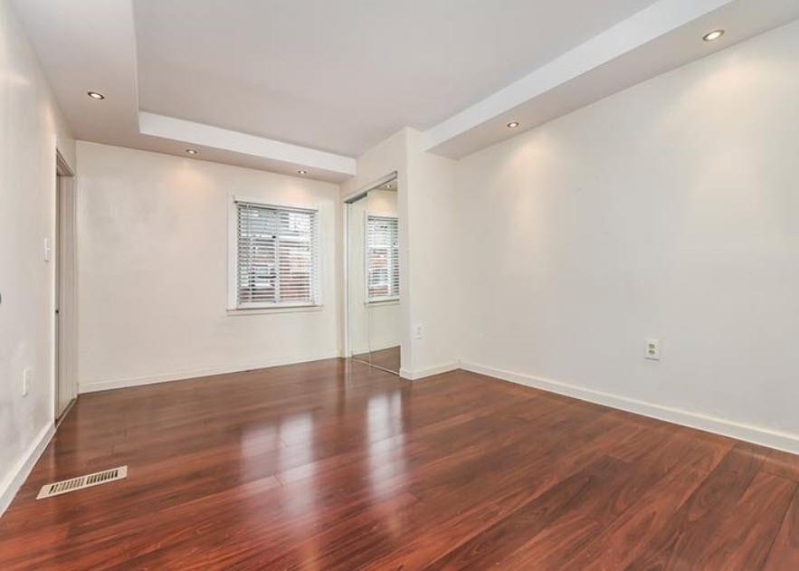 140 Home Street Pittsburgh, PA 15201 - Photo 15 of 25 an empty room with wooden floor and windows