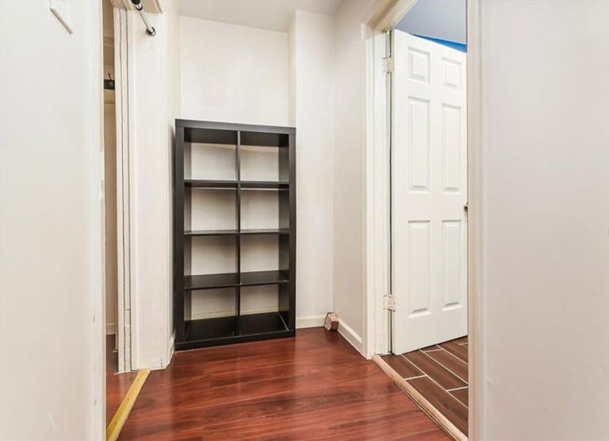 140 Home Street Pittsburgh, PA 15201 - Photo 19 of 25 a view of an empty room with wooden floor and closet