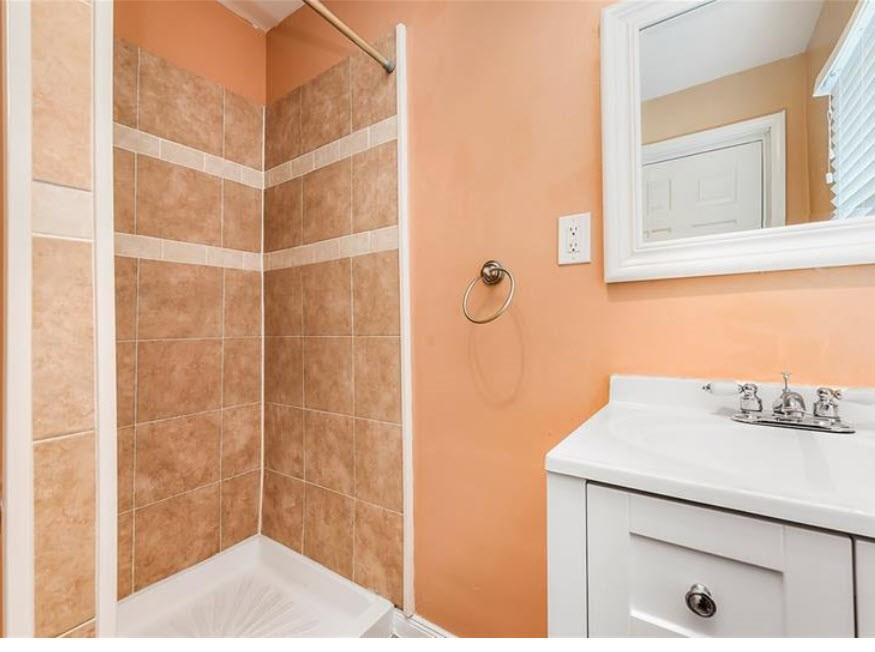 140 Home Street Pittsburgh, PA 15201 - Photo 21 of 25 a bathroom with a sink and a shower