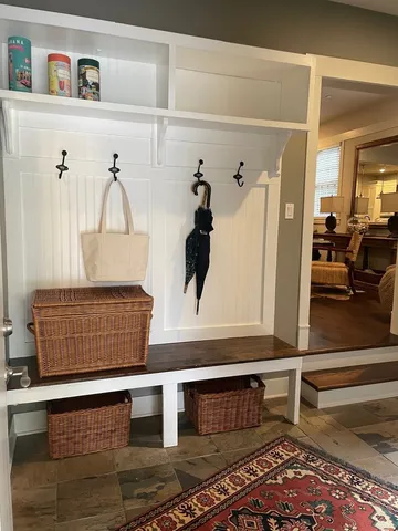 a bathroom with a sink a mirror and a bathtub