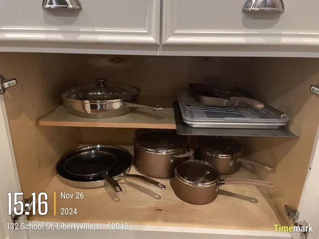 a room with furniture and book shelf
