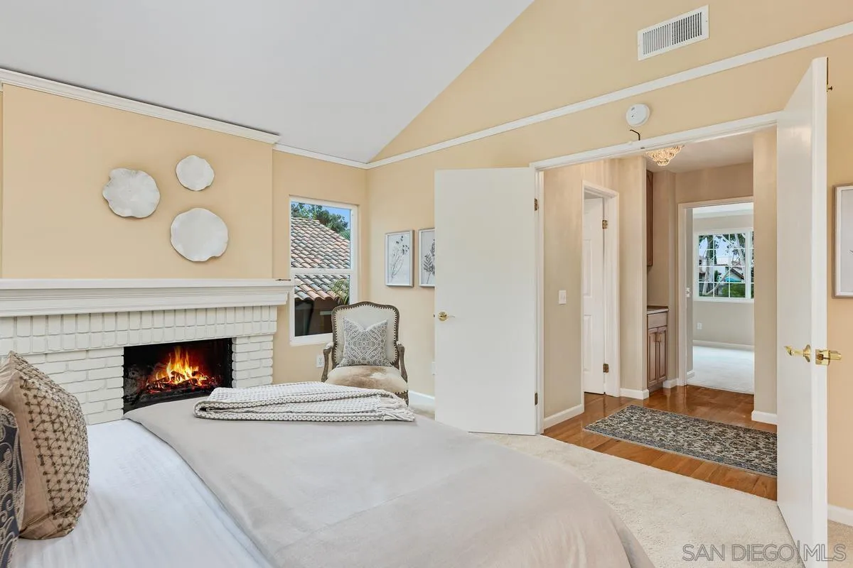 505 Willowspring Drive North Encinitas, CA 92024 - Photo 25 of 47 a living room with furniture and a fireplace