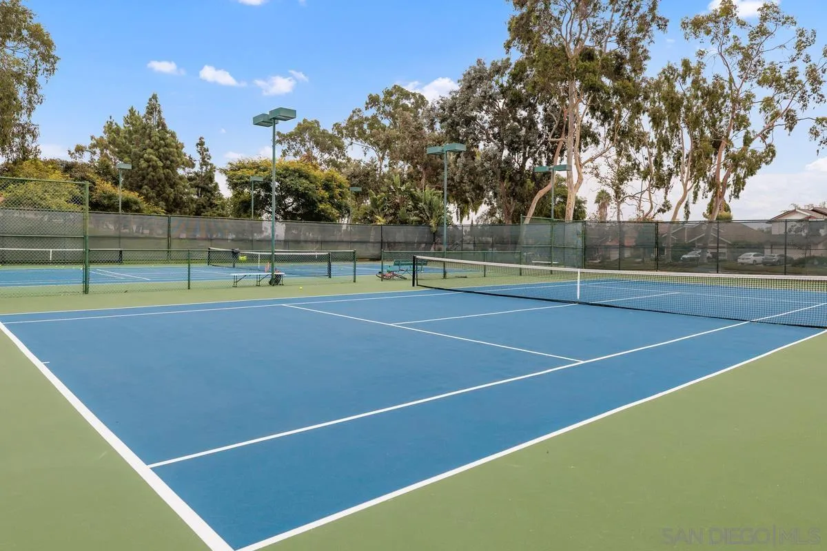 505 Willowspring Drive North Encinitas, CA 92024 - Photo 34 of 47 a view of tennis court with trees in the background