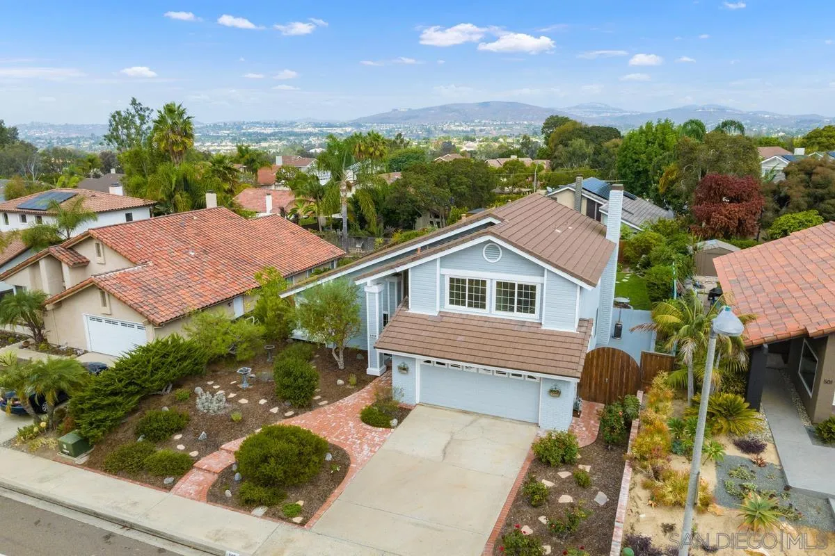 505 Willowspring Drive North Encinitas, CA 92024 - Photo 38 of 47 a view of a house with a yard and plants