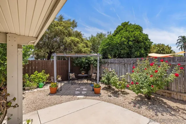 a garden view with a seating space