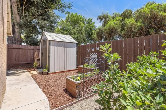a garden view with a seating space