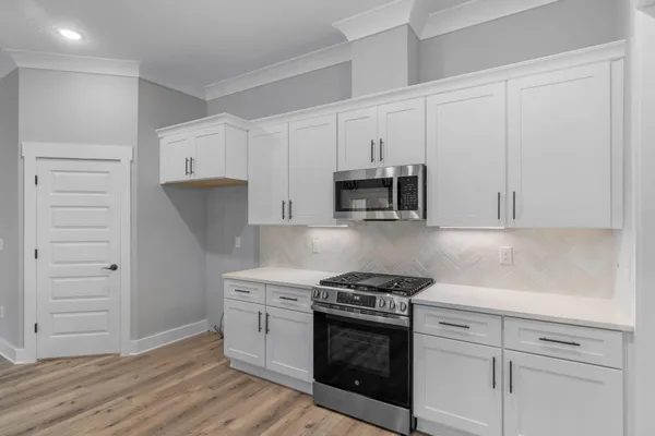 a view of cabinets with sink