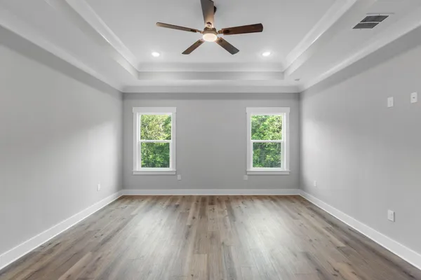 a bathroom with double sink and a mirror