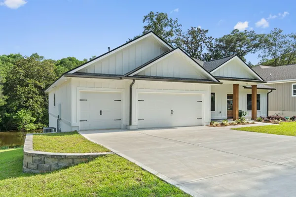 a house with trees in front of it