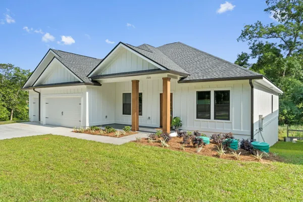 a front view of house with yard