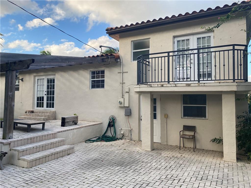 1430 Northeast 4th Court Boca Raton, FL 33432 - Photo 3 of 15 a house view with a outdoor space