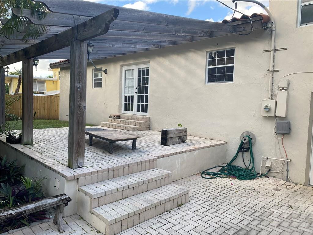 1430 Northeast 4th Court Boca Raton, FL 33432 - Photo 4 of 15 a outdoor space with furniture