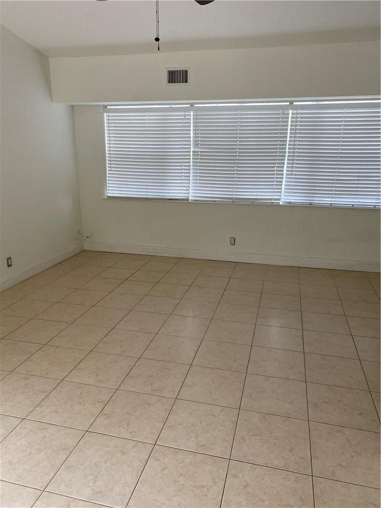 1430 Northeast 4th Court Boca Raton, FL 33432 - Photo 8 of 15 a view of an empty room with cabinet