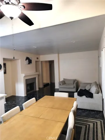 a bedroom with a bed and a fireplace