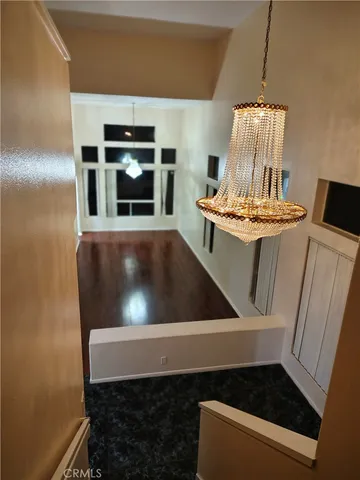 a kitchen with a sink and a stove top oven