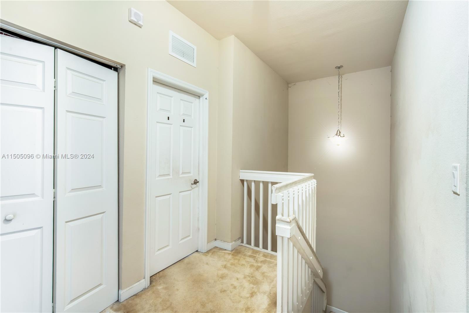 11368 Southwest 238th Street Homestead, FL 33032 - Photo 17 of 18 a view of entryway with wooden floor