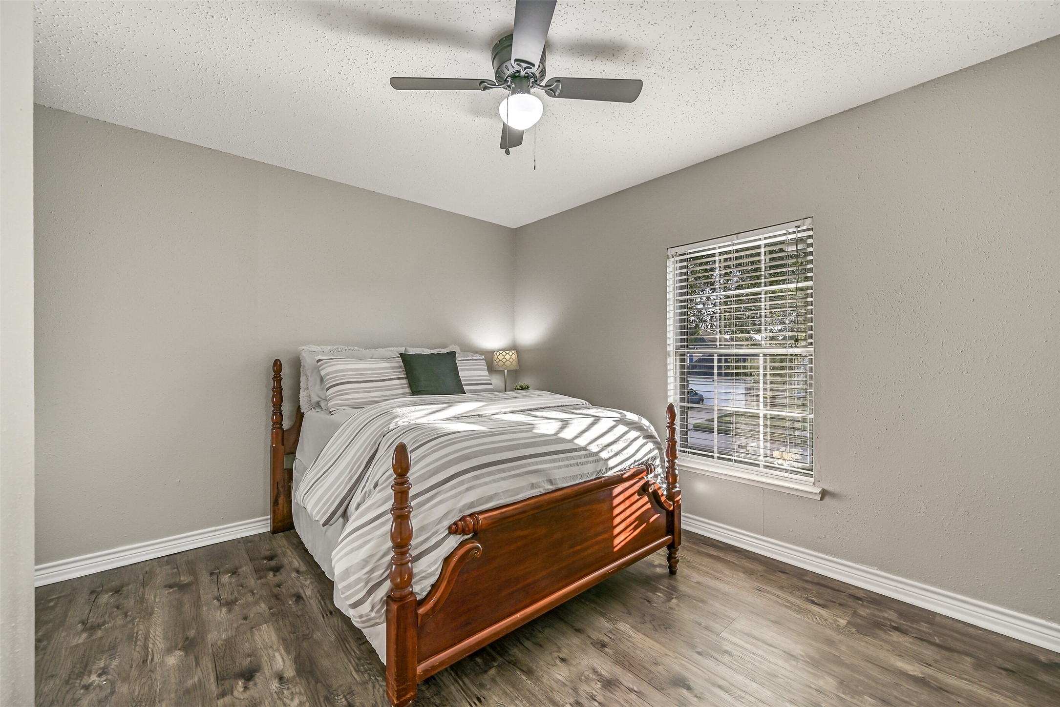 2503 Colleen Drive Pearland, TX 77581 - Photo 17 of 23 a bed sitting in a bedroom next to a window