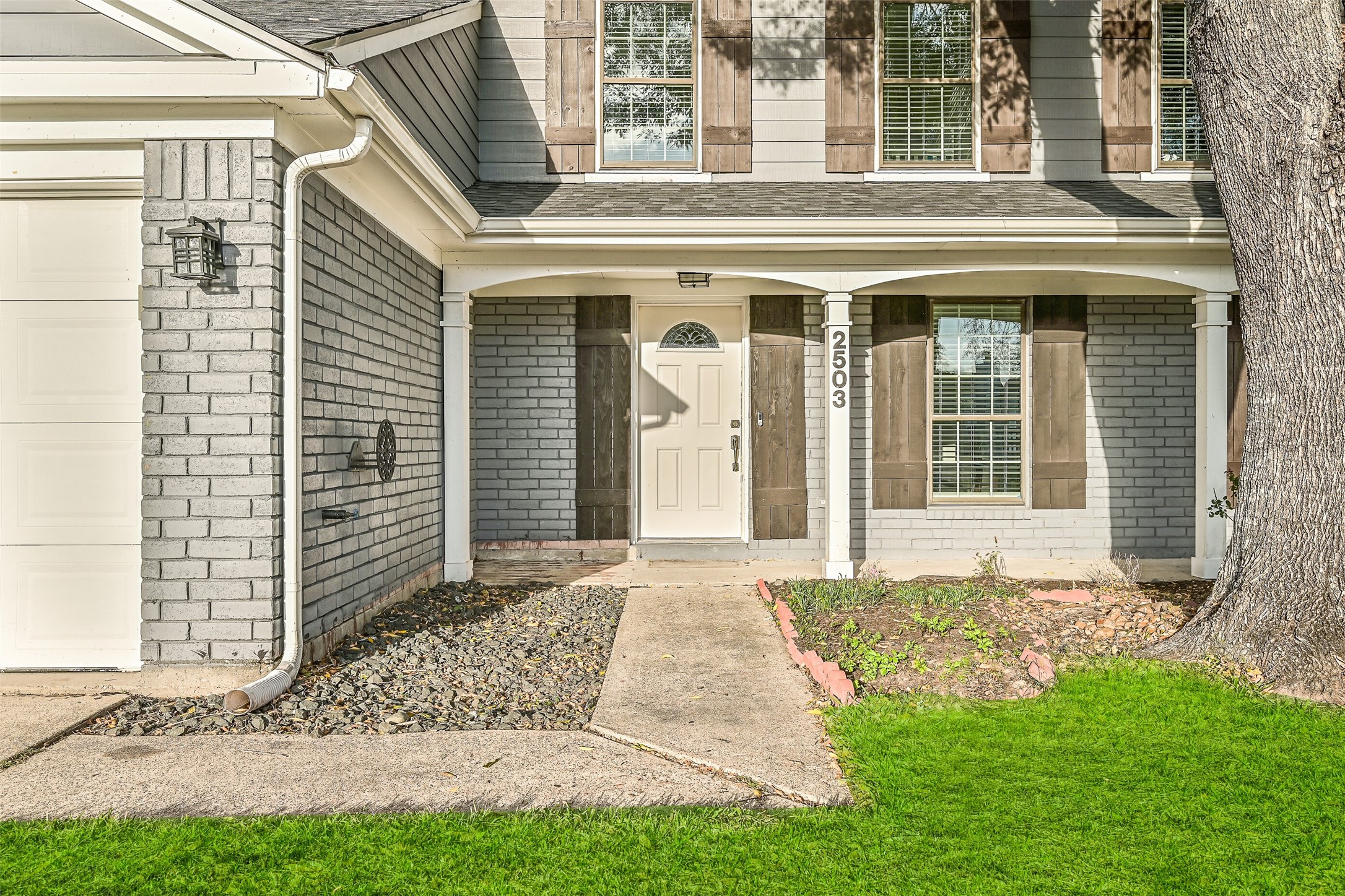 2503 Colleen Drive Pearland, TX 77581 - Photo 2 of 23 a front view of a house with a yard