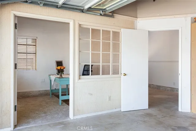 a room with furniture and window