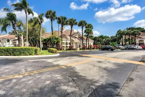 a view of swimming pool with chairs