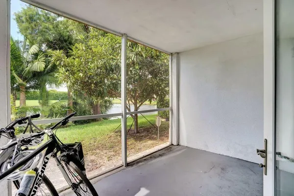 a view of a lake with houses in the back