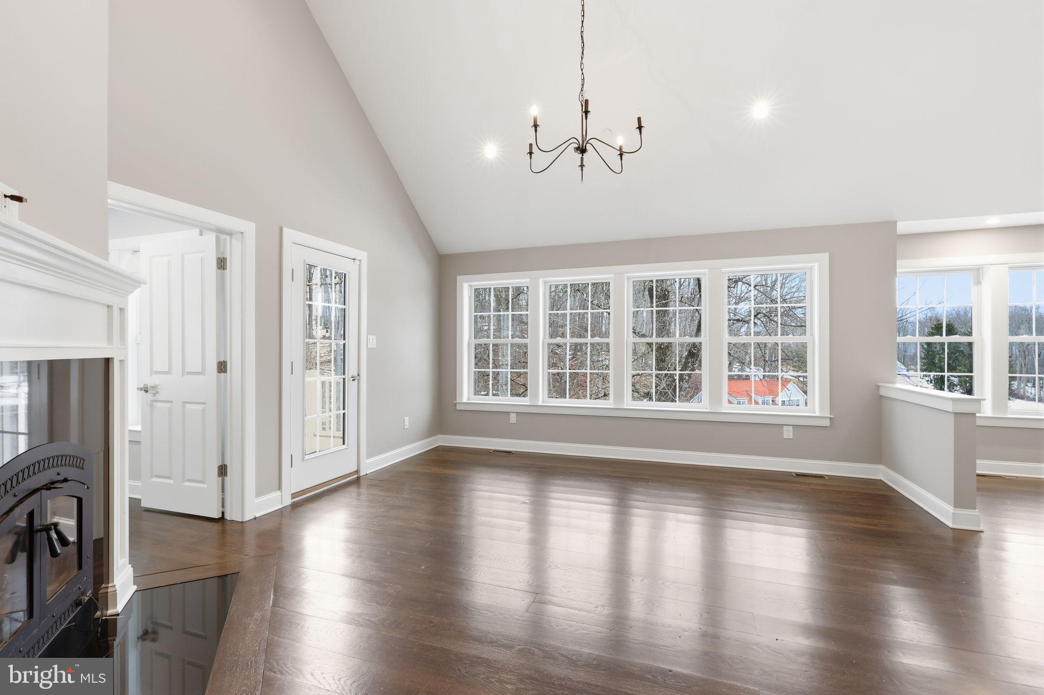 3039 Durham Road Doylestown, PA 18902 - Photo 121 of 122 a view of an empty room with wooden floor and a window