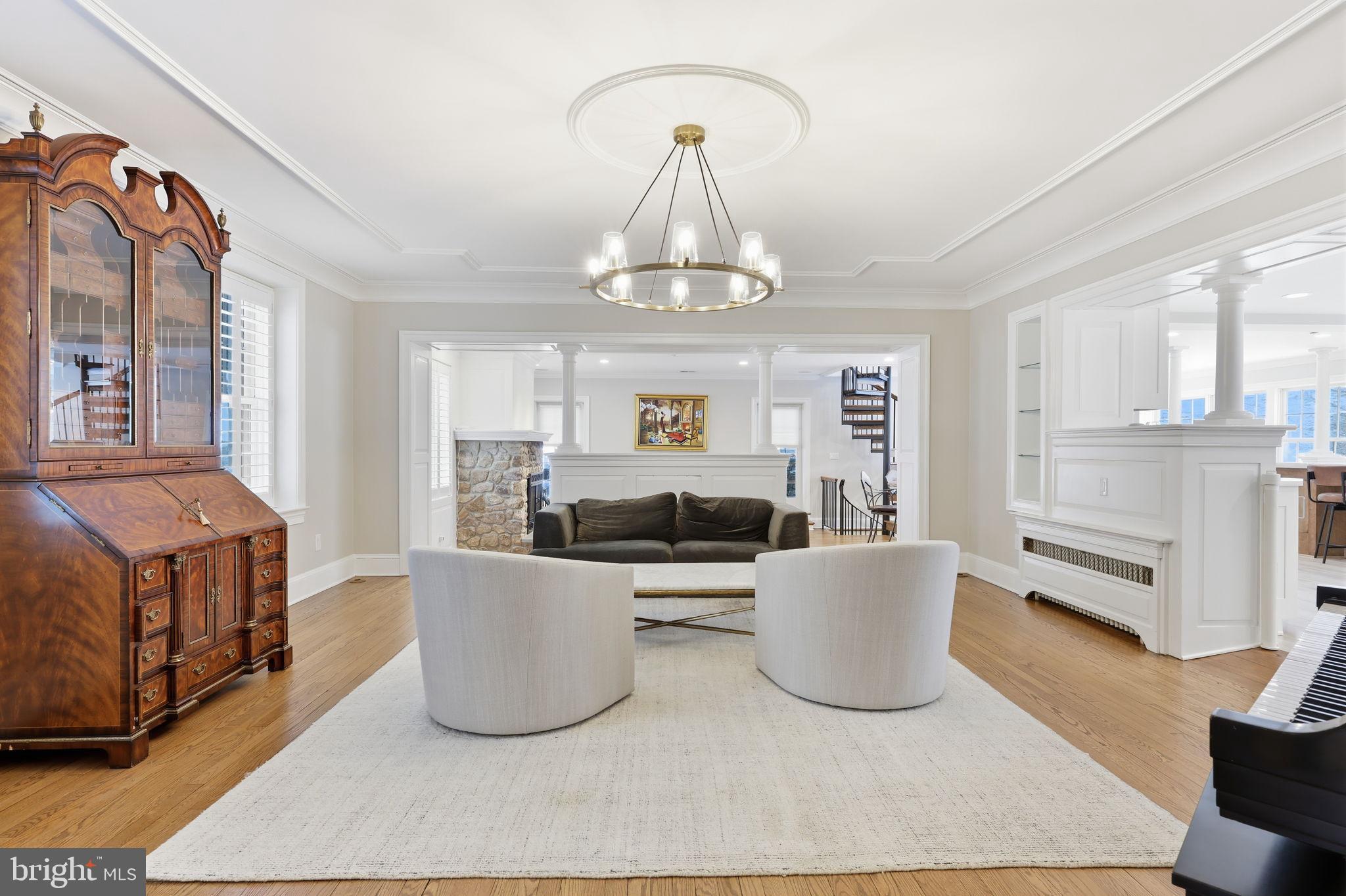 3039 Durham Road Doylestown, PA 18902 - Photo 20 of 122 a living room with a couch and chandelier