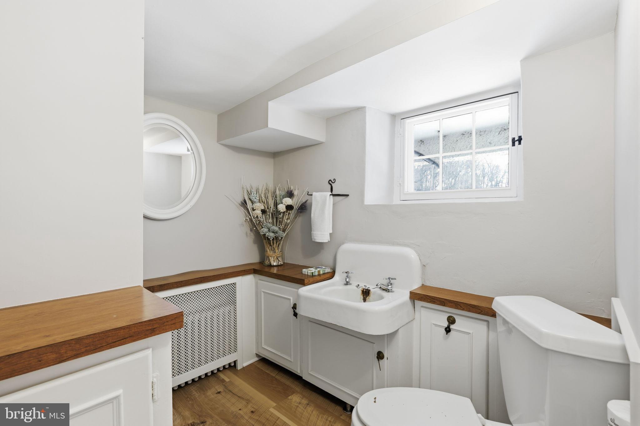 3039 Durham Road Doylestown, PA 18902 - Photo 81 of 122 a bathroom with a sink mirror and toilet