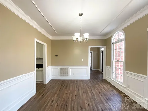 a view of a livingroom with wooden floor