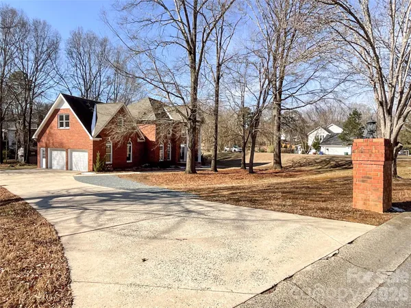 a view of city with tall trees