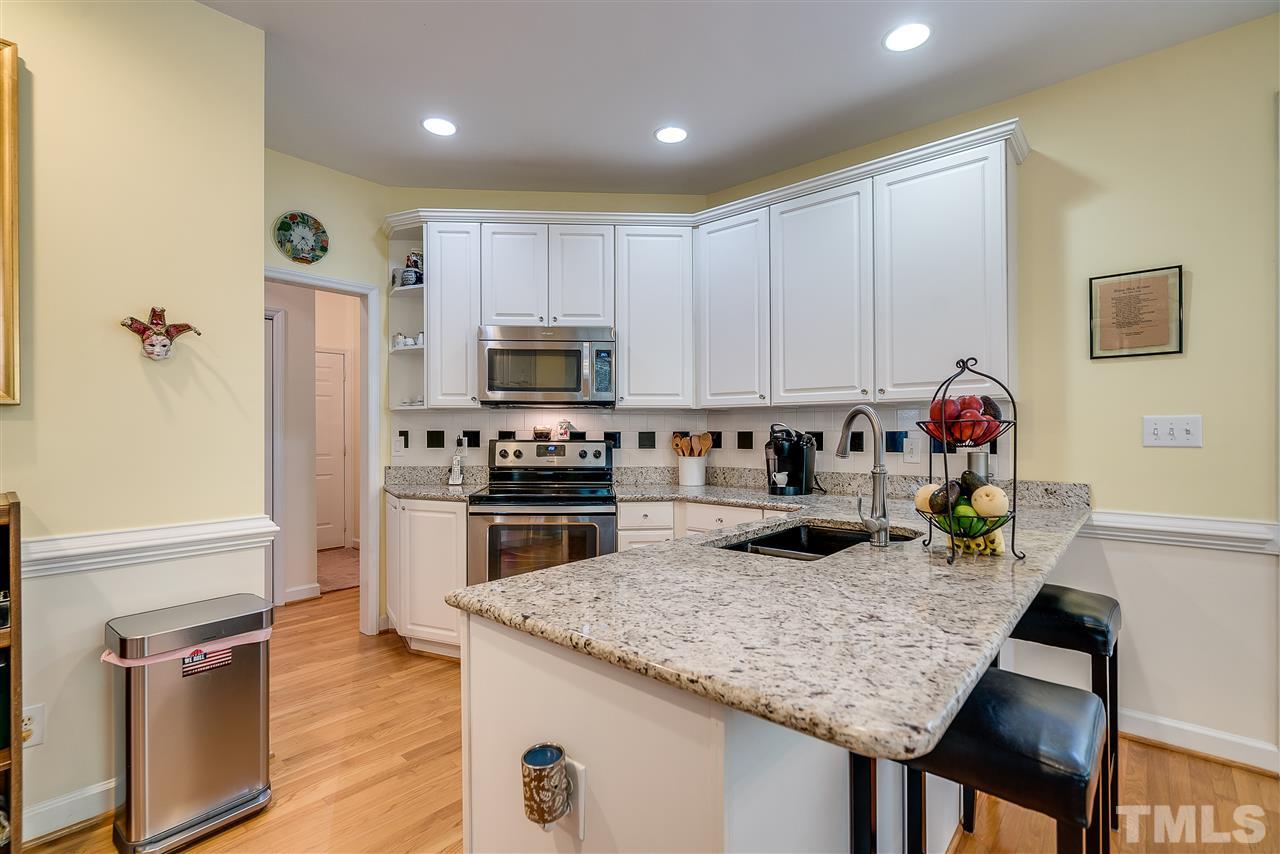 5721 Garrett Road Durham, NC 27707 - Photo 12 of 25 Lots of room for entertaining or cooking up a storm in this kitchen.