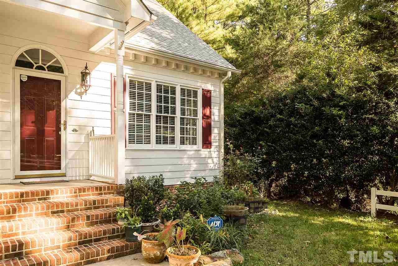 5721 Garrett Road Durham, NC 27707 - Photo 3 of 25 Covered front porch, with plenty of room for your garden